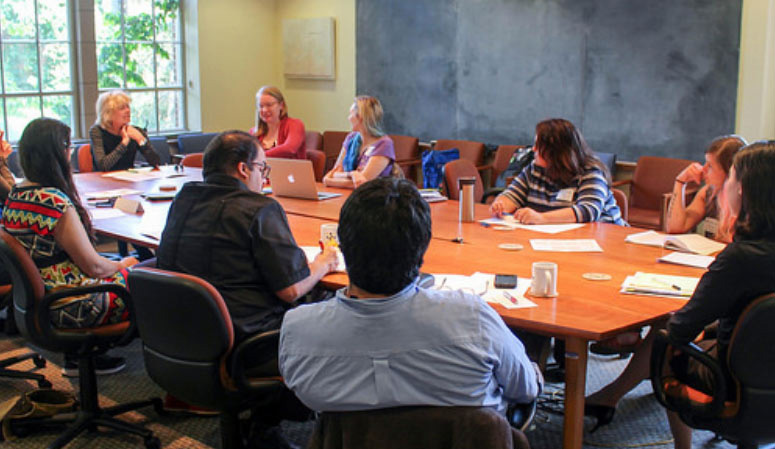 people gathered around a conference table